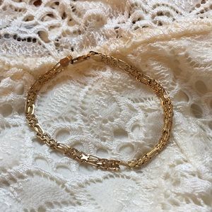 Three 14k bracelets one one 14k necklace.